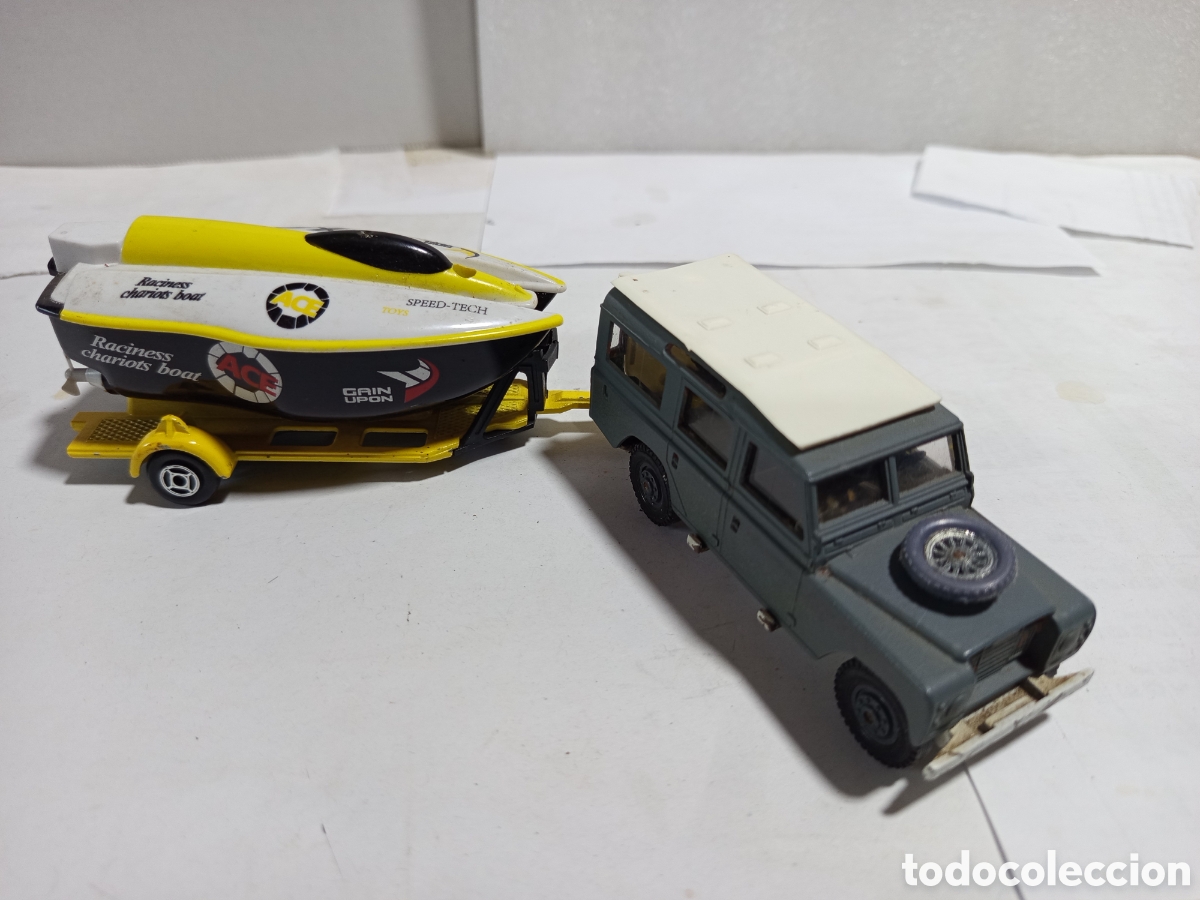 Modellautos: Land Rover con carro y lancha