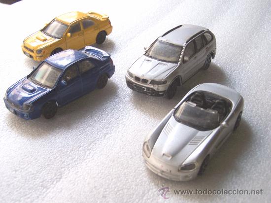 Coches a escala: 4 coches Maisto, los de la foto