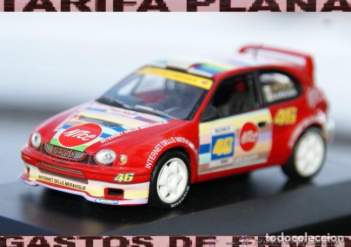 Coches a escala: TOYOTA COROLLA WRC RALLY MONZA 2004 V.ROSSI - C.CASSINA ESCALA 1:43 DE ALTAYA EN CAJA no original