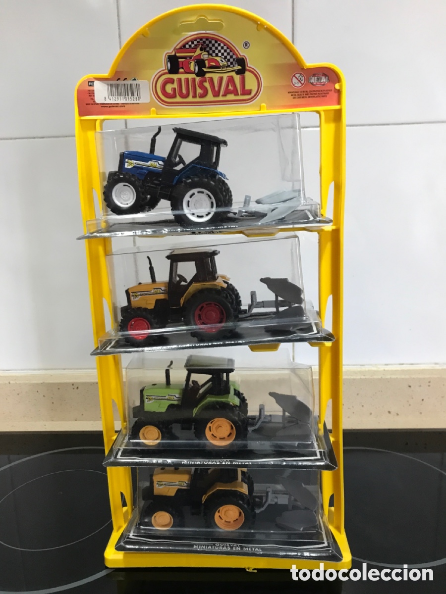 Coches a escala: Expositor con 4 Tractores de Guisval E 1:43