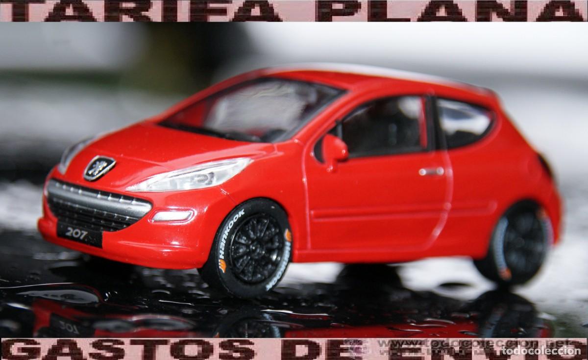Voitures &agrave; l'&eacute;chelle: PEUGEOT 207 ROJO RACING MODIFICADAS LAS RUEDAS , ESTAS ESTAN PEGADAS , NO SE MUEVEN ESTAN FIJAS ESCA