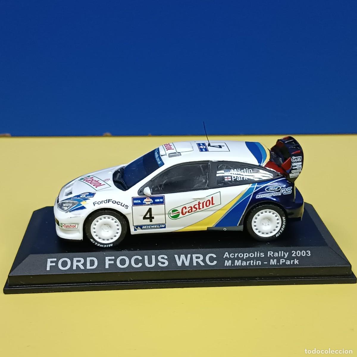 Auto in scala: FORD FOCUS WRC - ACROPOLIS RALLY 2003 M.MARTIN - M.PARK - COCHE ESCALA 1:43 - ALTAYA - CON PEANA
