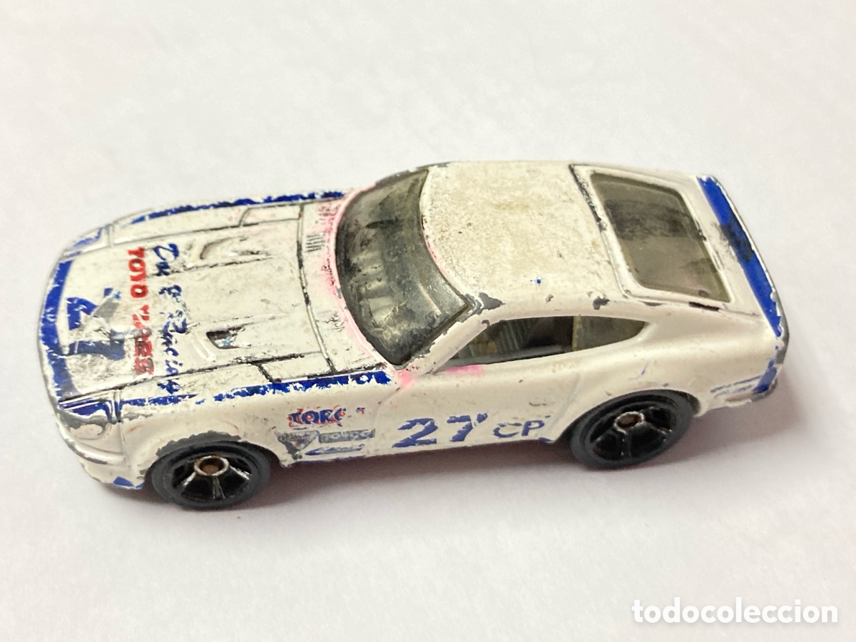 Voitures &agrave; l'&eacute;chelle: Coche DATSUN 240Z Hotwheels made in Malasia/ CX4