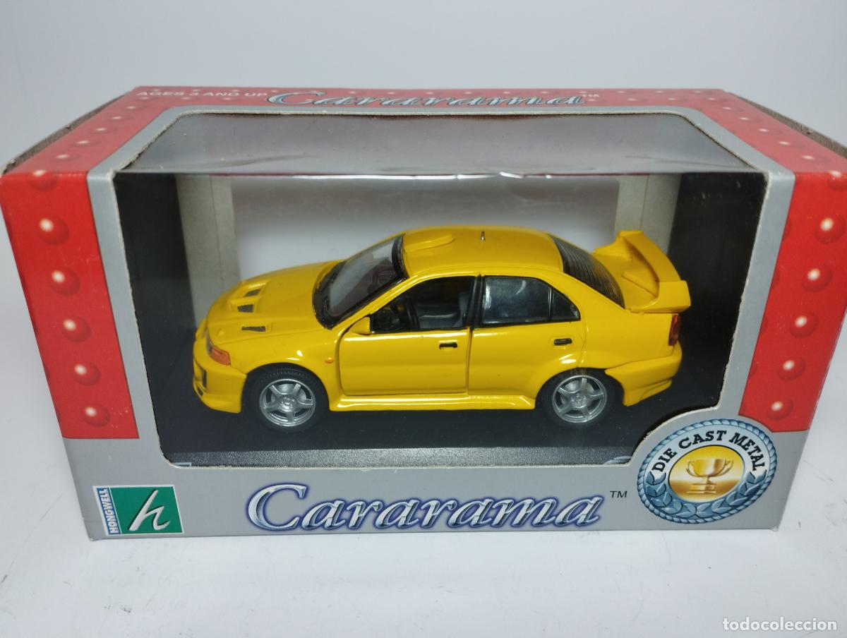 Coches a escala: MITSUBISHI LANCER EVO VI DE CARARAMA HONGWELL ESCALA 1,43 NUEVO EN SU CAJA