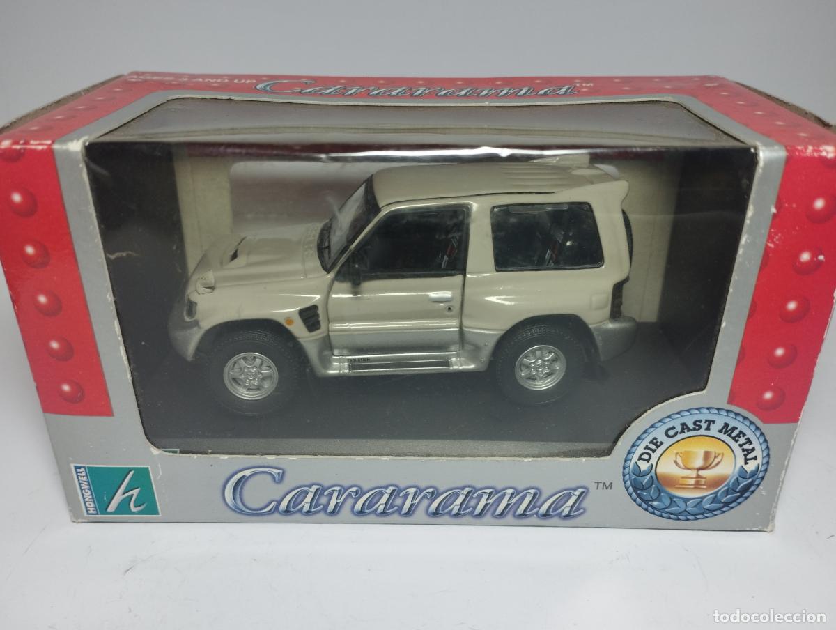 Coches a escala: MITSUBISHI PAJERO MONTERO EVO III DE HONGWELL CARARAMA ESCALA 1,43 NUEVO EN SU CAJA