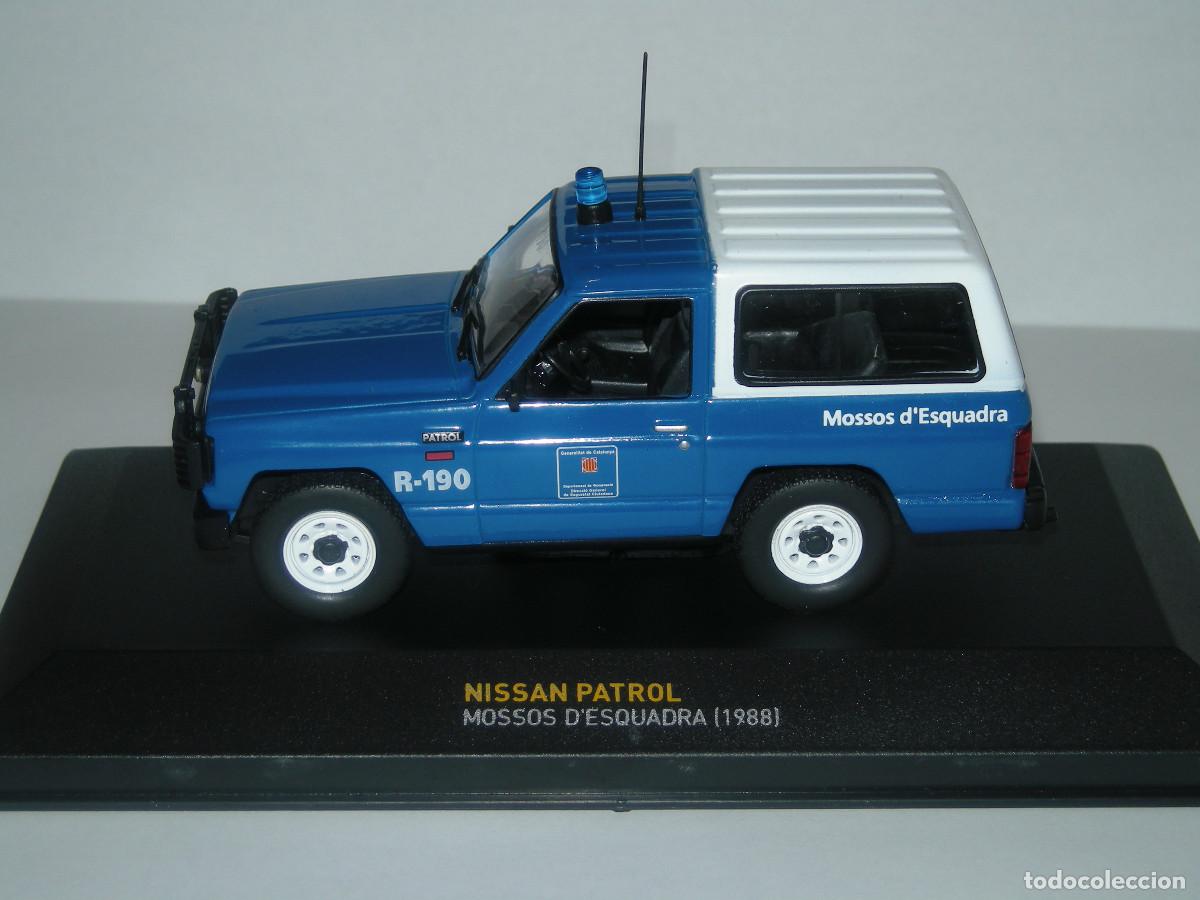 Voitures &agrave; l'&eacute;chelle: NISSAN PATROL MOSSOS D'ESQUADRA (1988) COLOR AZUL Y BLANCO