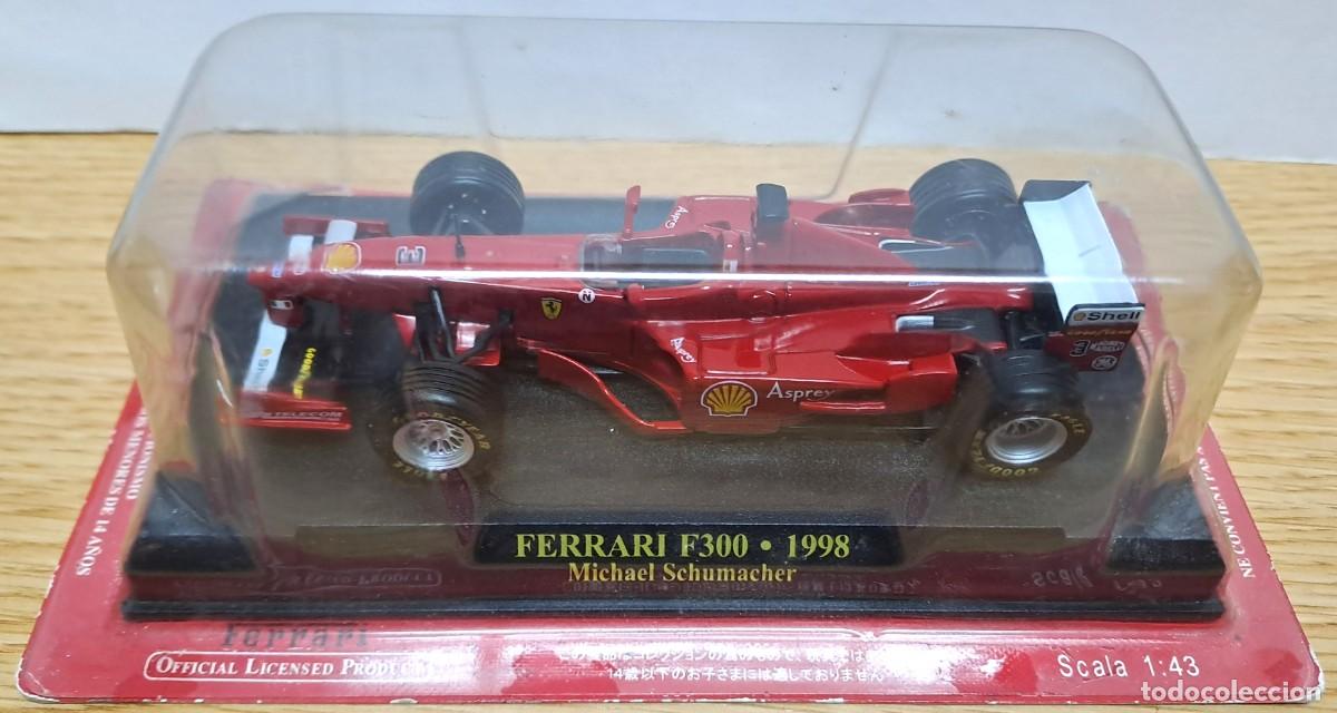 Carros em escala: FERRARI F300 DE 1998 A SCALA 1:43, EDICCIONES DE ALTAYA, PILOTO MICHAEL SCHUMACHER. FERRARI-55