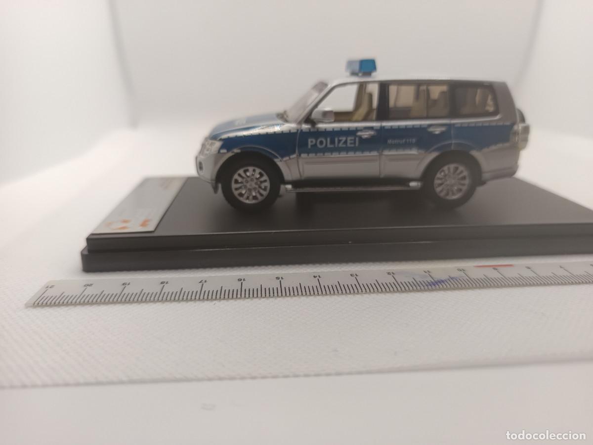 Coches a escala: Mitsubishi Montero/Pajero 2007 Polizei Coche de policia escala 1:43 PRX Ixo Serie limitada