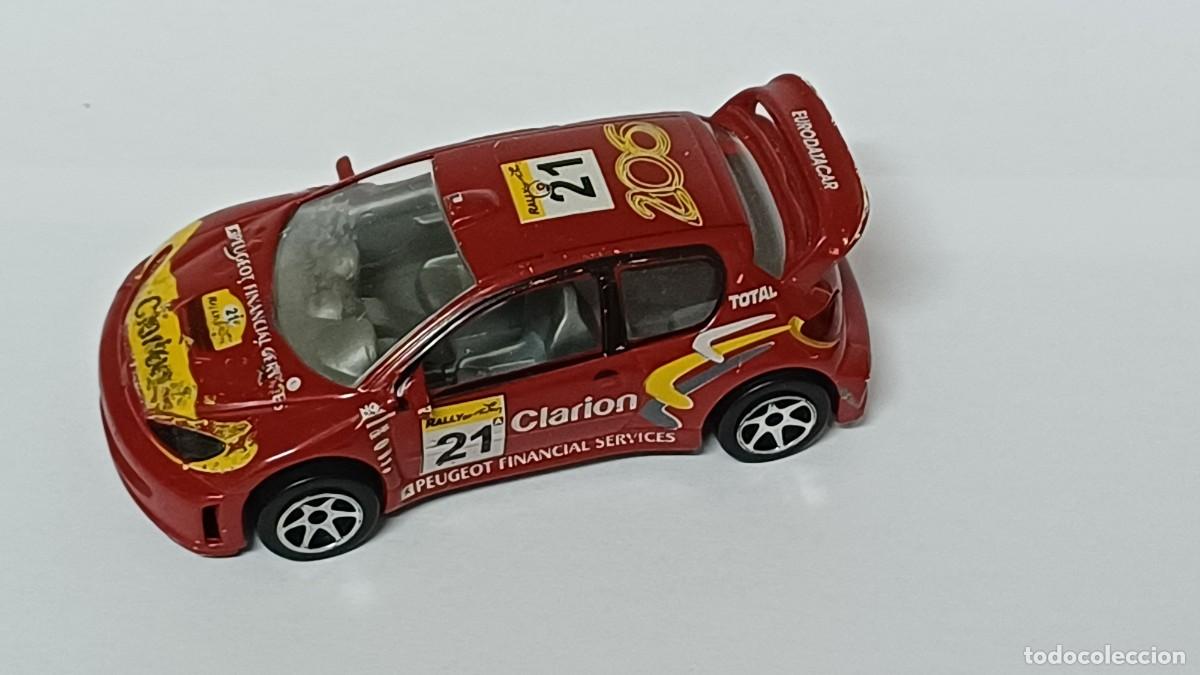 Coches a escala: COCHE A ESCALA PEUGEOT 206 WRC HELLER 1/43