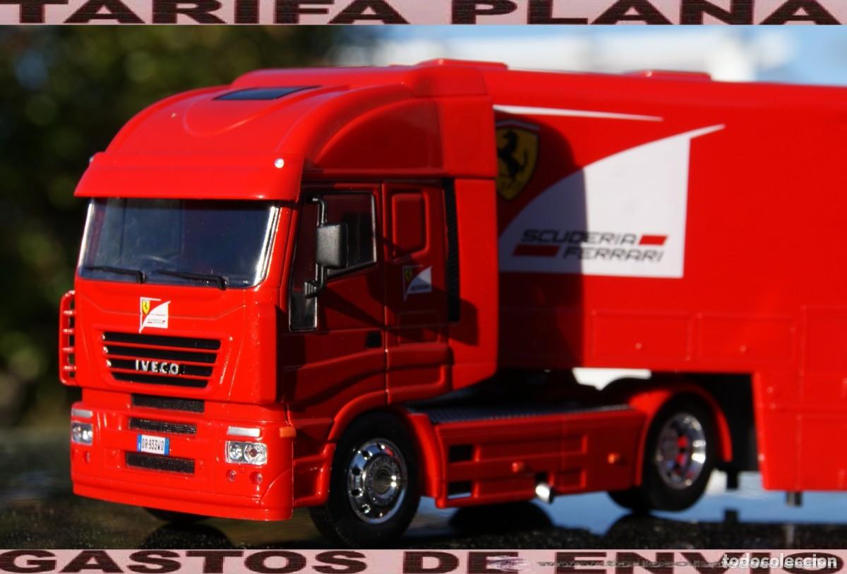 Coches a escala: CAMION IVECO STRALIS transporte F1 SCUDERIA FERRARI 2011 ESCALA 1:43 EN blister