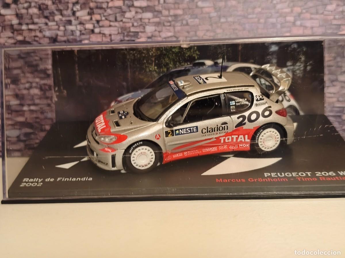 Coches a escala: Rally. Peugeot 206 WRC. M. Gronholm-Finlandia 2002. Escala 1/43. Leer bien descripci&oacute;n