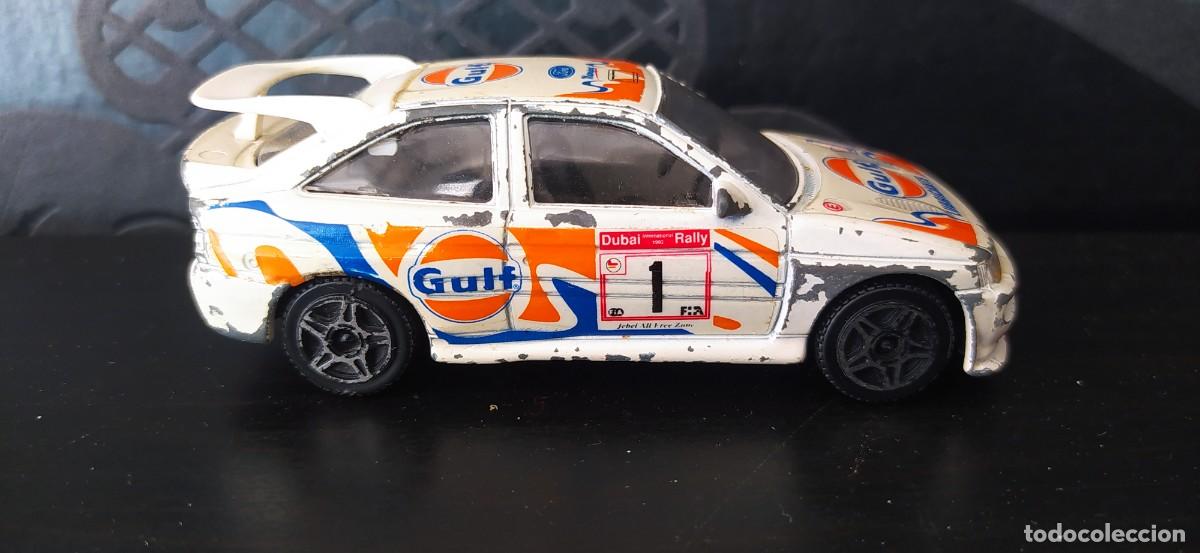 Coches a escala: FORD SCORT RS BURAGO ESCALA 1/43