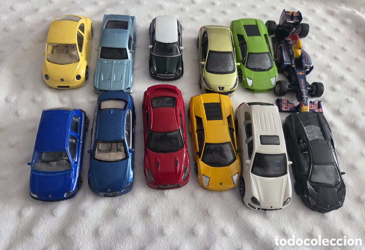 Coches a escala: Lote 12 coches bburago varios