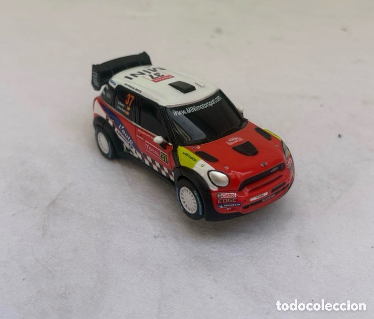 Coches a escala: Mini Cooper WRC n&ordm; 37 Slot Cartronic 1:43 &ndash; Coche de rally con im&aacute;n