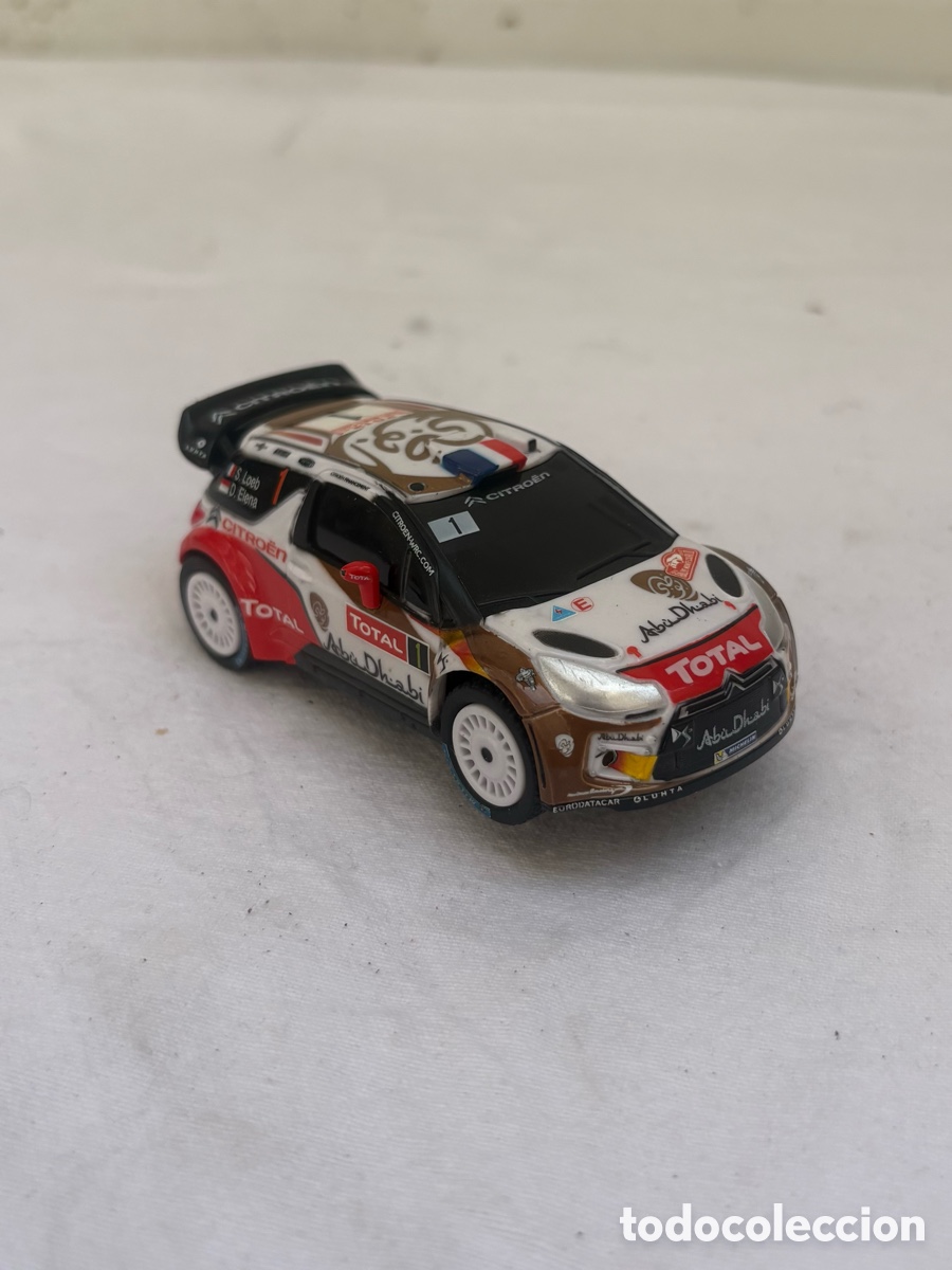 Coches a escala: Citro&euml;n DS3 WRC n&ordm; 1 Abu Dhabi Total Slot Cartronic 1:43 &ndash; Loeb/Elena