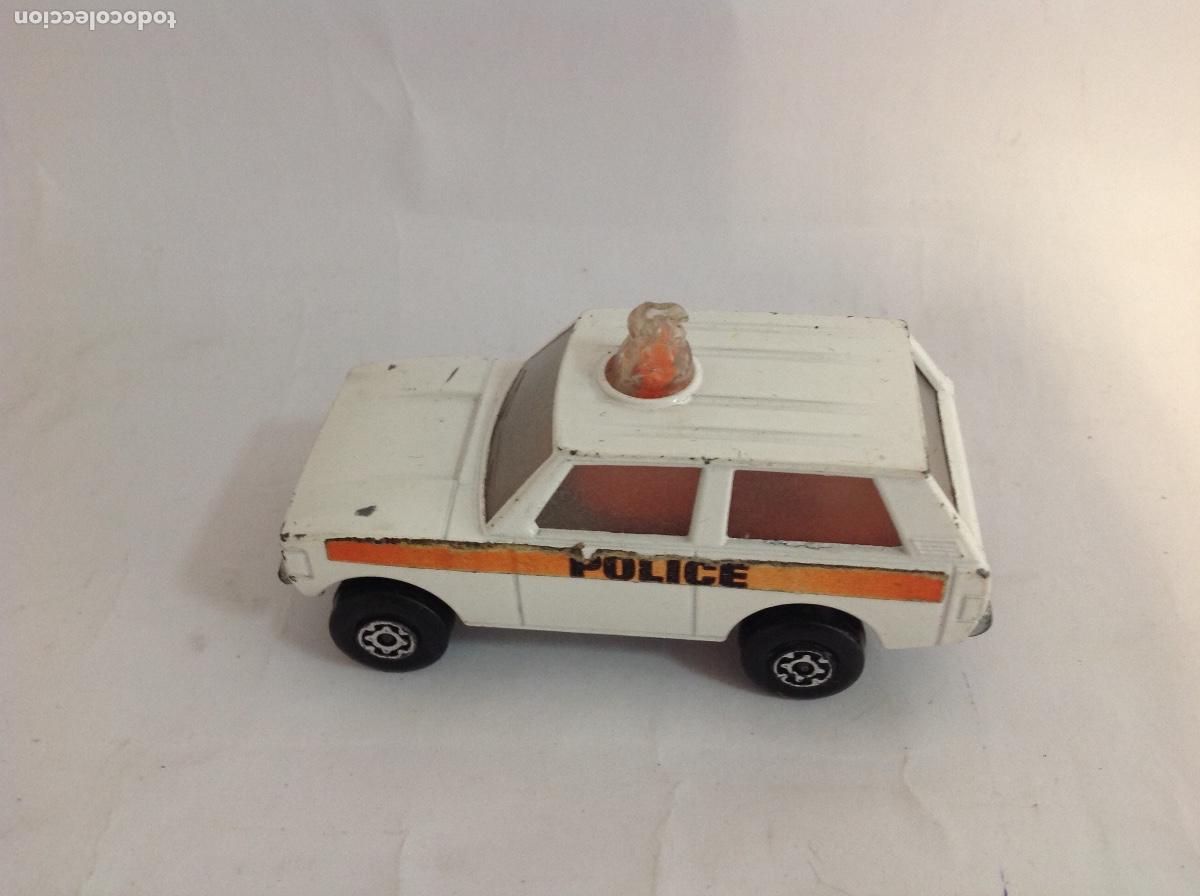 Coches a escala: Coche de polic&iacute;a modelo Patrol. Inglaterra ROLAMATICS. A&Ntilde;OS 80