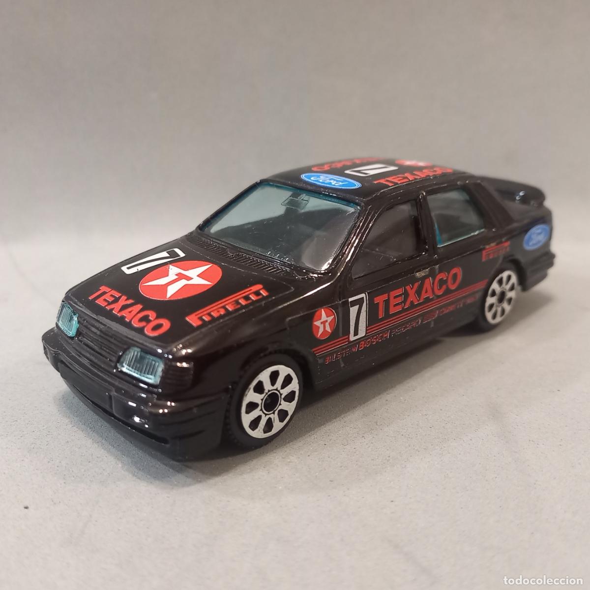 Ford Sierra negro, publicidad Texaco, escala 1/43 de bBurago. (Burago)