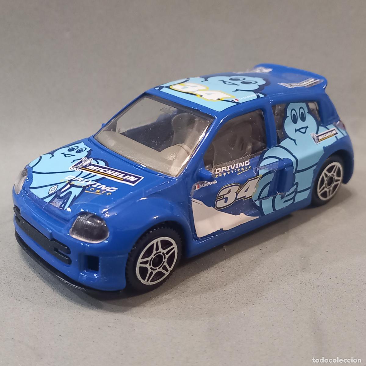 Coches a escala: Renault Clio Trophy, segunda generaci&oacute;n, con decoraci&oacute;n Michelin, escala 1/43 de bBurago. (Burago)