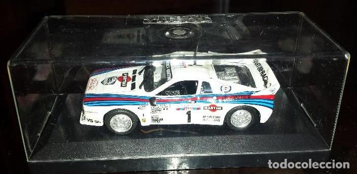 Coches a escala: LANCIA 037 RALLY RALLYE tour de corse 1982 A.BETTEGA - M.PERISSINOT ESCALA 1/43 DE VITESSE EN cajA