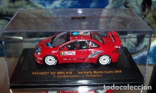 Coches a escala: PEUGEOT 307 WRC N&ordm;16 RALLYE DE MONTECARLO 2006 T.GARDEMEISTER - J.HONKANEN escala 1/43 de ixo EN SU