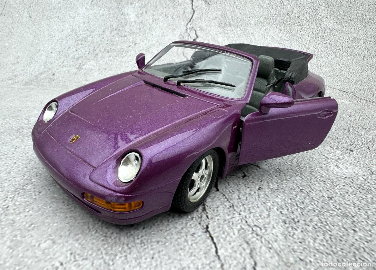 Coches a escala: El coche de juguete deportivo Porsche Carrera 911 Cabriolet, de Bburago, de 1993, est&aacute; fabricado en