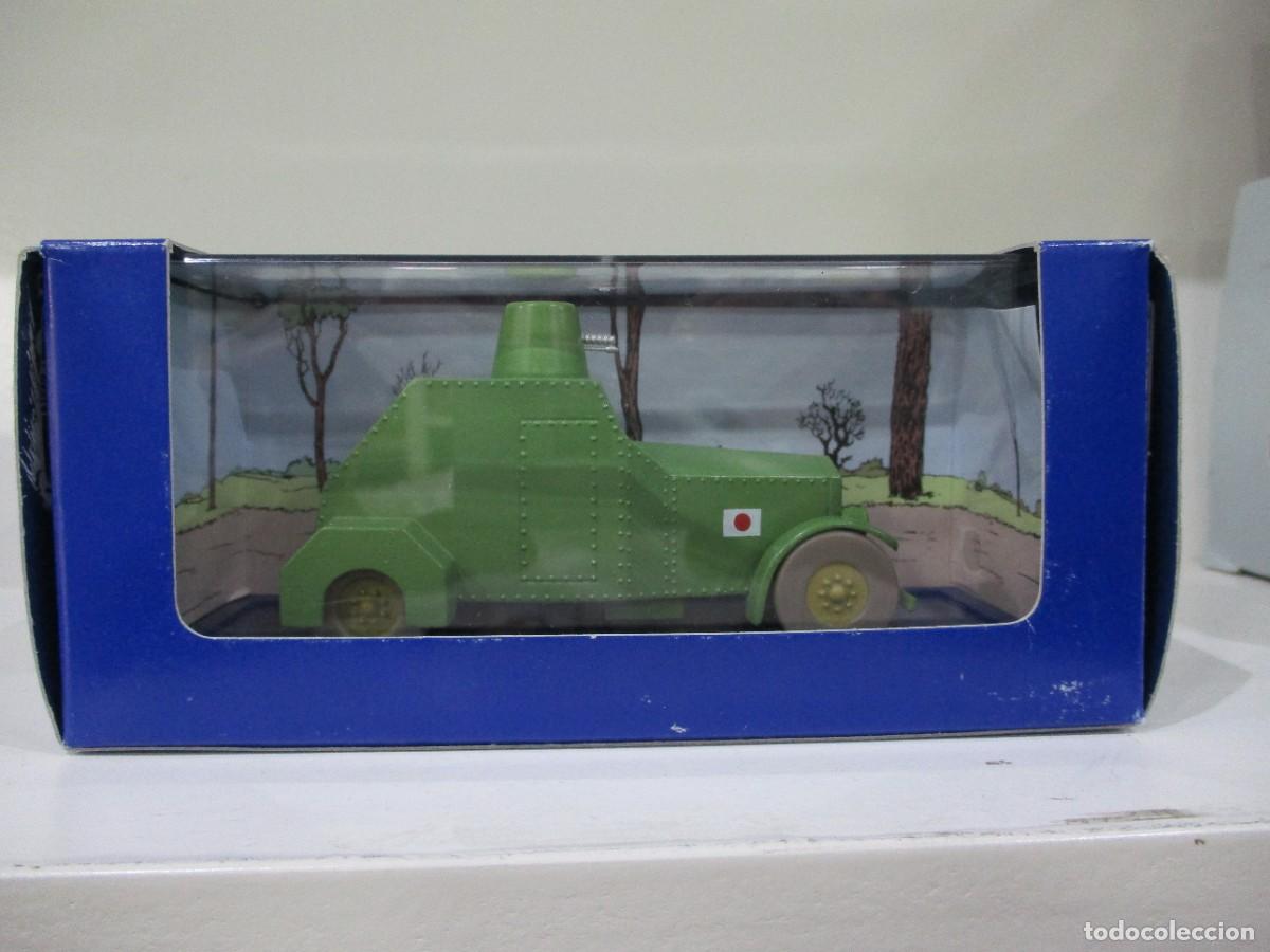 Coches a escala: COCHE TINTIN - TANQUE AMETRALLADORA - EL LOTO AZUL CON FOLLETO -ATLAS - ESCALA 1/43 - NUEVO