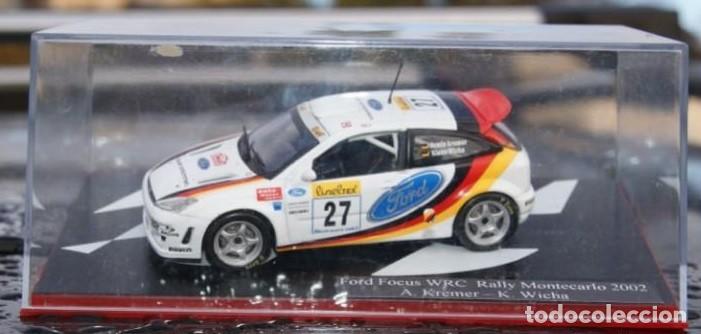 Coches a escala: FORD FOCUS WRC RALLYE DE MONTECARLO 2002 A.KREMER - K.WICHA modificadas s las ruedas ESCALA 1/43 DE