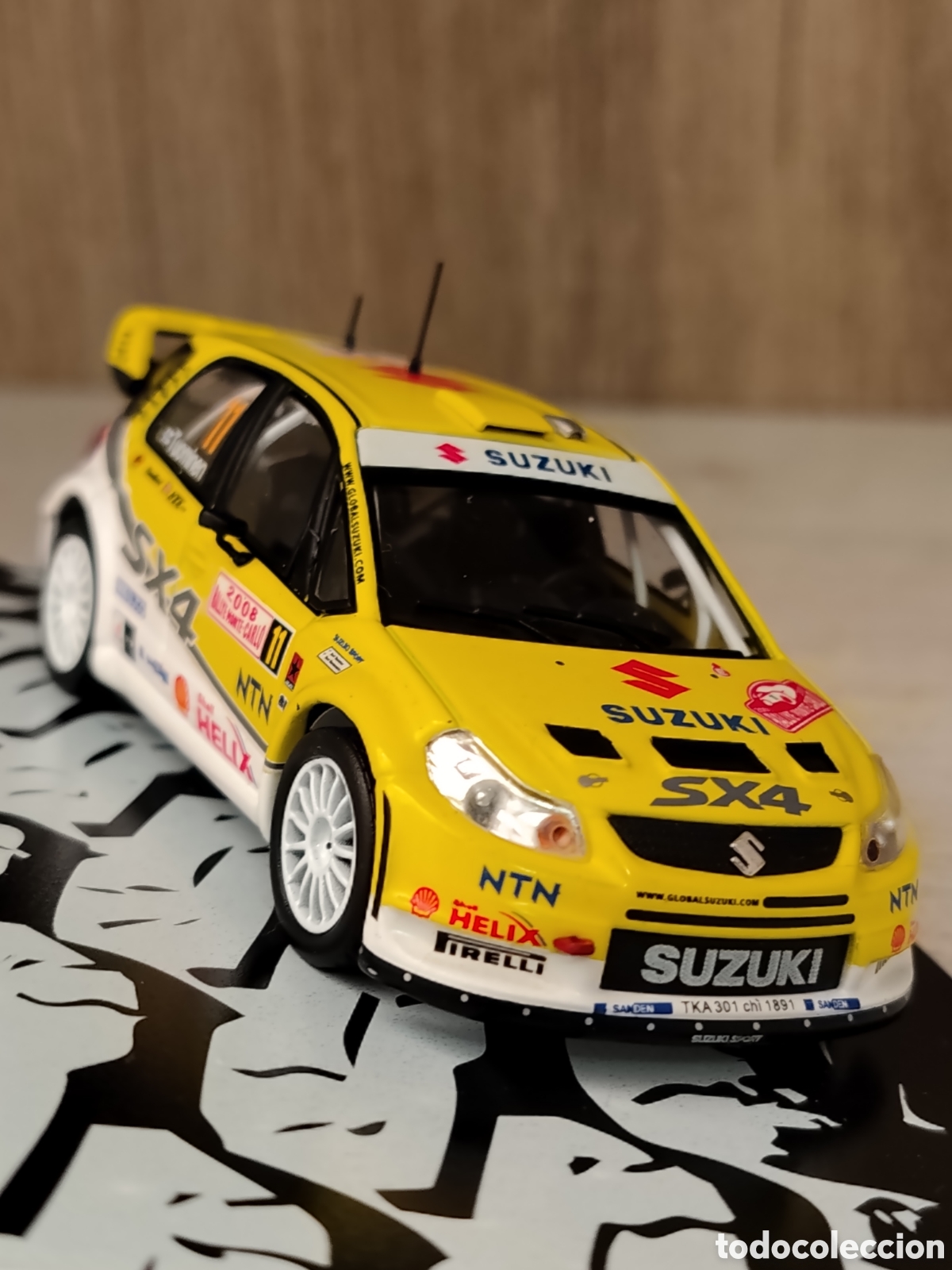 Coches a escala: SUZUKI SX4 WRC e 1.43. .