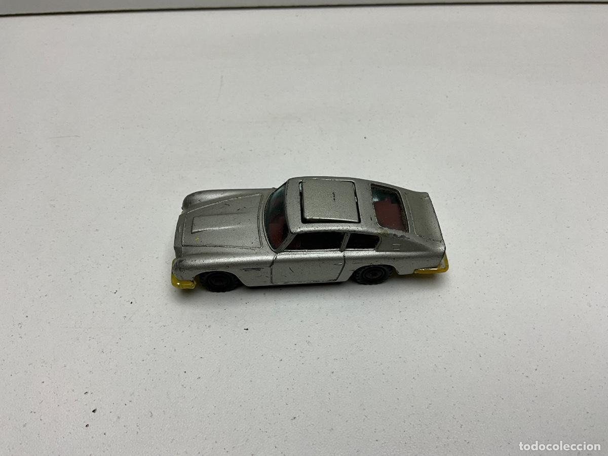 Coches a escala: COCHE HUSKY - JAMES BOND ASTON MARTIN - PENDING - MADE IN ENGLAND - FUNCIONA EL DISPARADOR