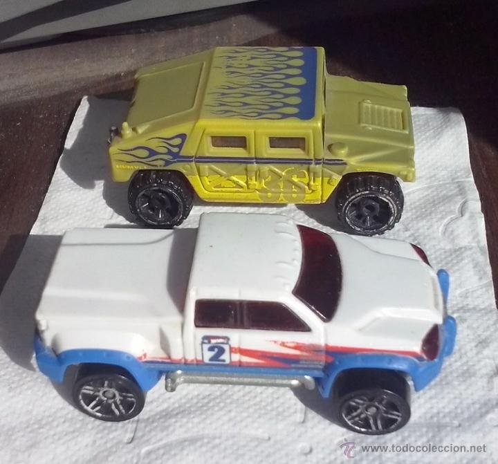 Model cars Hot Wheels: Hot Wheels CAMBIO COLOR - Coche 4x4 Todoterreno HUMVEE H1 desierto verde oliva MEGA DUTY blanco azul
