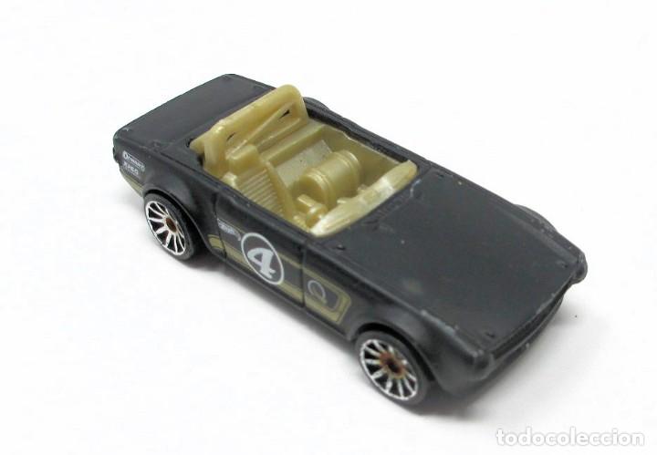 Coches a escala Hot Wheels: Triumph TR6 de Hot Wheels - Hotwheels - Malasia 2009.
