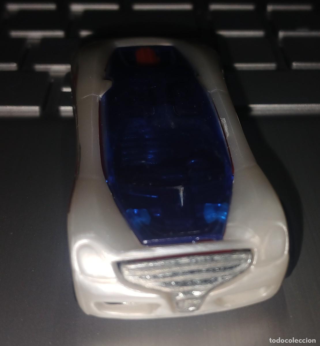 Coches a escala Hot Wheels: Hot Wheels Nitrium 2009 blanco azul y rojo - Foto 2