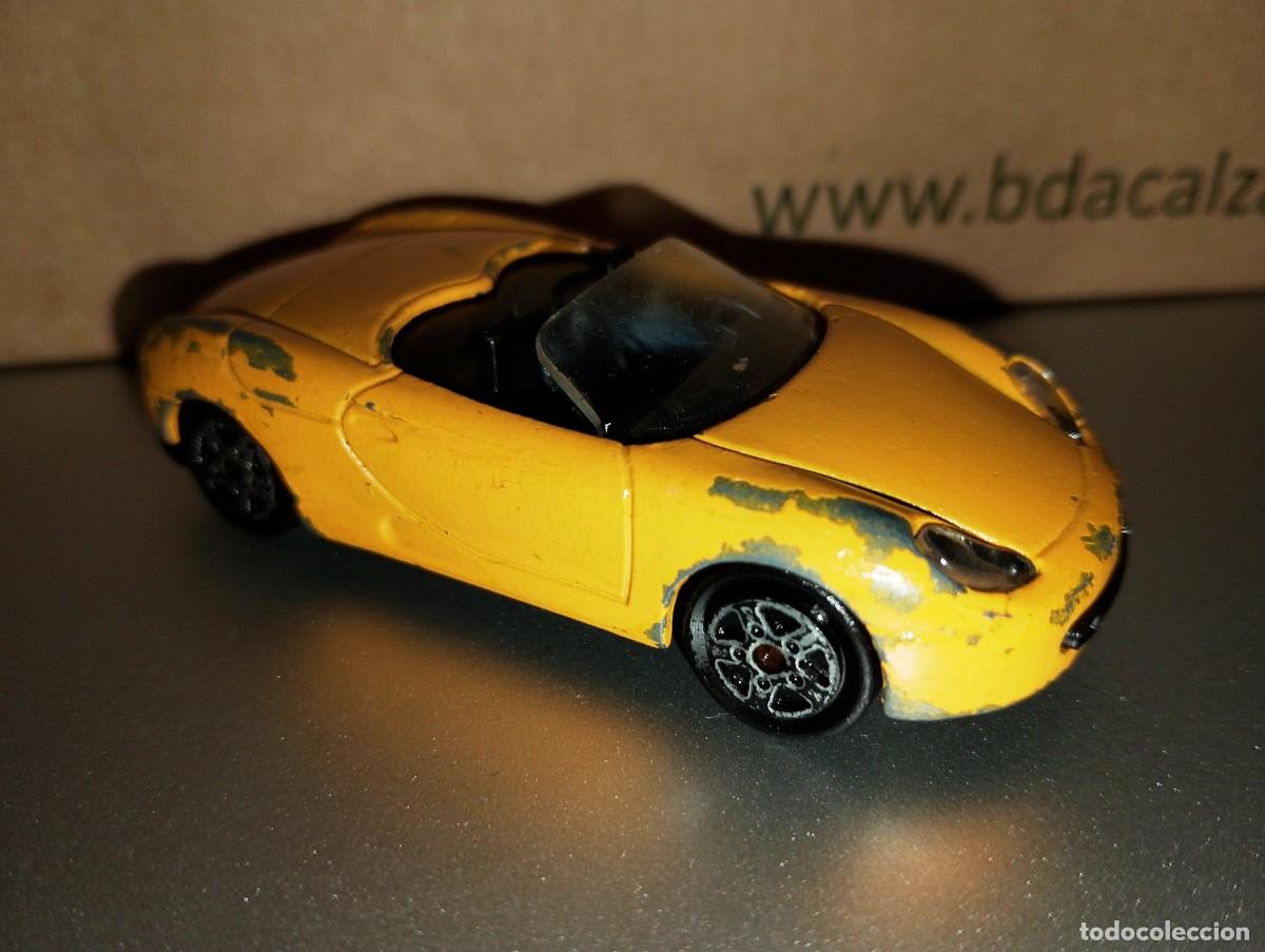 Coches a escala Hot Wheels: Porsche Boxter Amarillo de Majorette