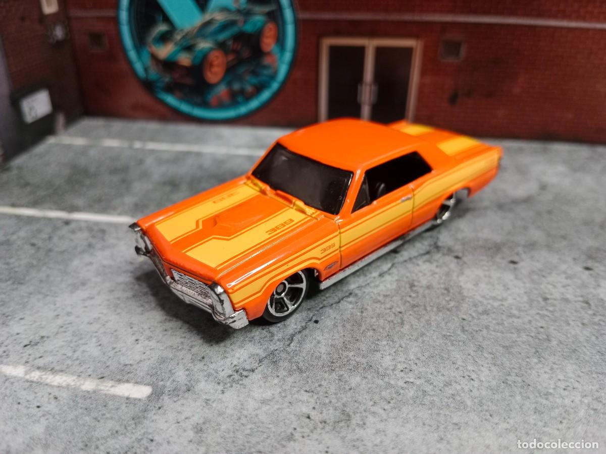 Coches a escala Hot Wheels: Pontiac GTO '65 Hot Wheels 2011 Street Beasts Mattel
