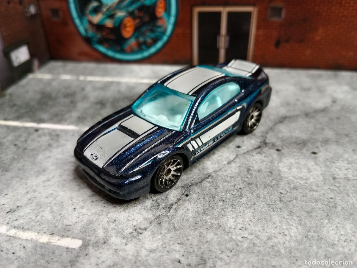 Coches a escala Hot Wheels: Ford Mustang '99 Hot Wheels 2014 HW City: Mustang 50th Mattel