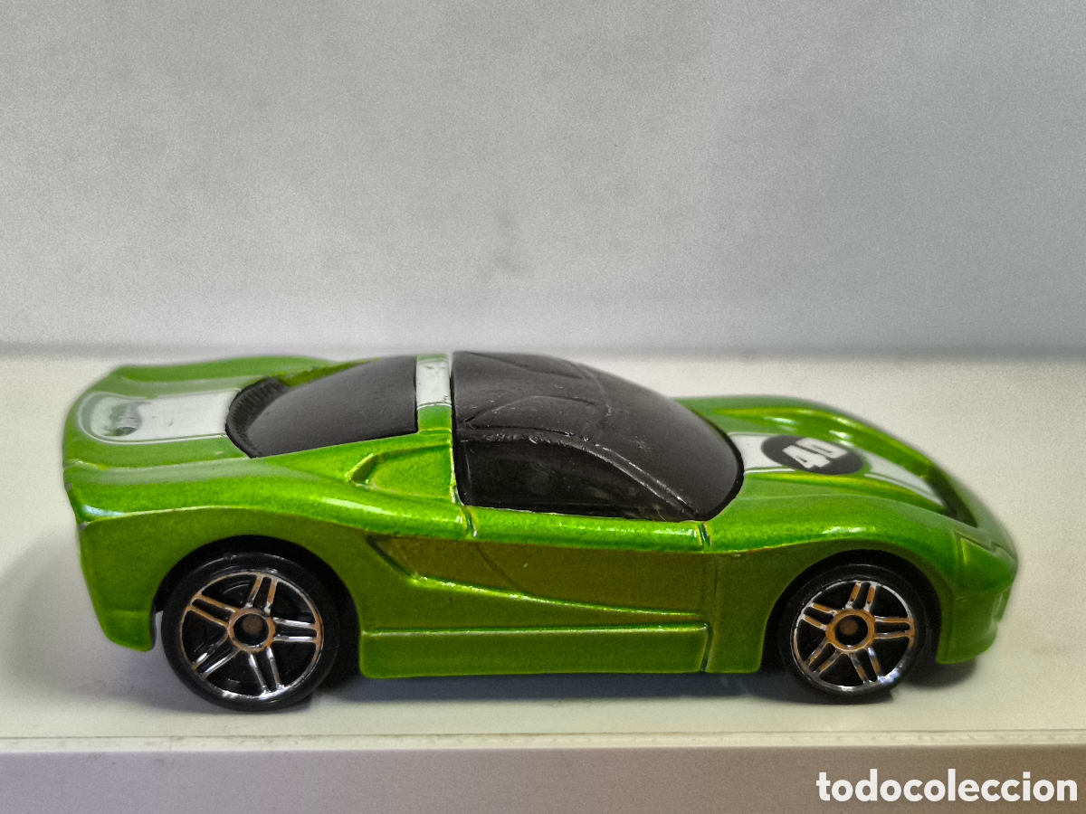 Coches a escala Hot Wheels: Hot Wheels modelo 40 Somethin' en color verde met&aacute;lico 2001