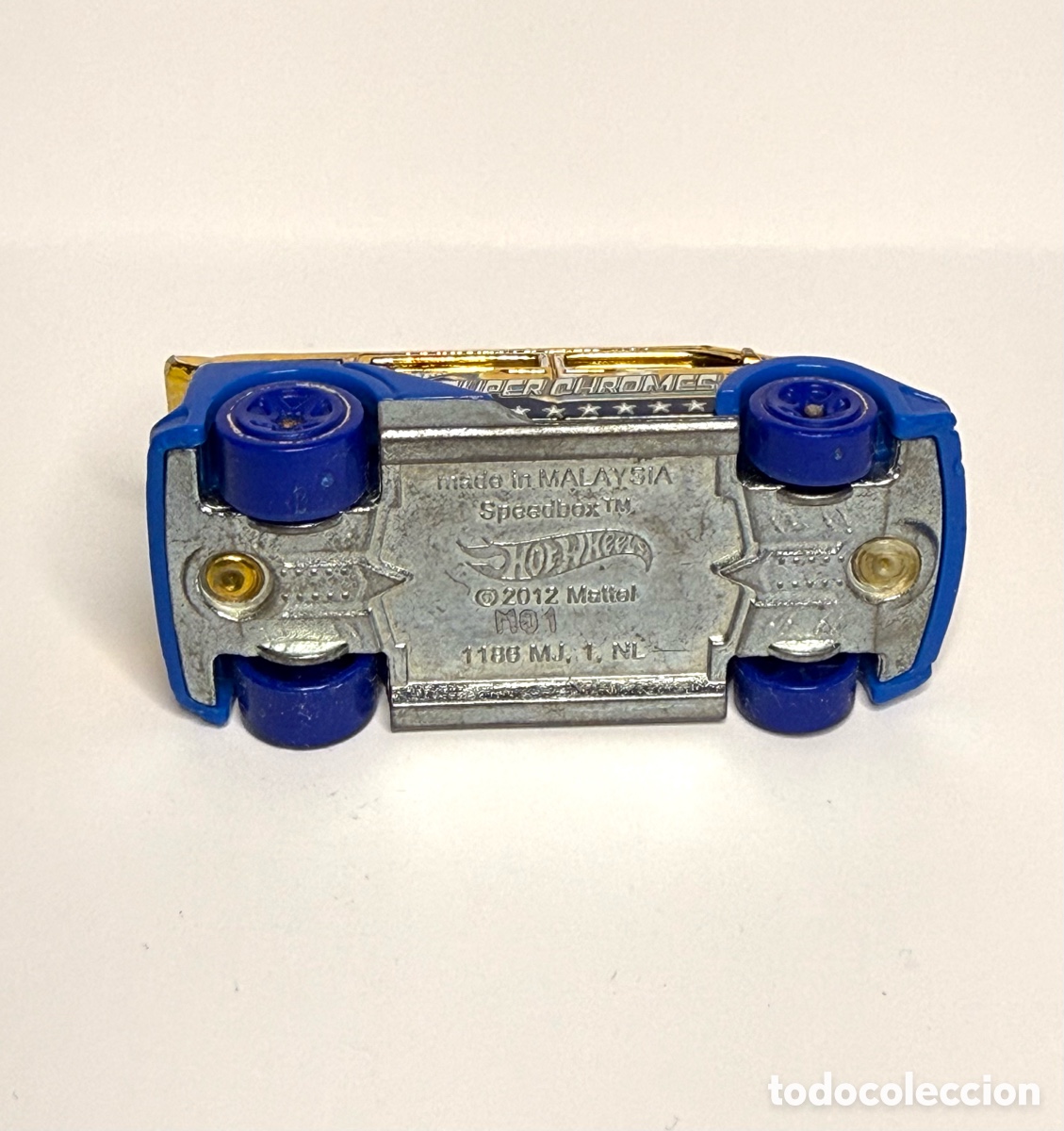 Coches a escala Hot Wheels: Hot Wheels Speedbox dorado 2012 - Foto 6