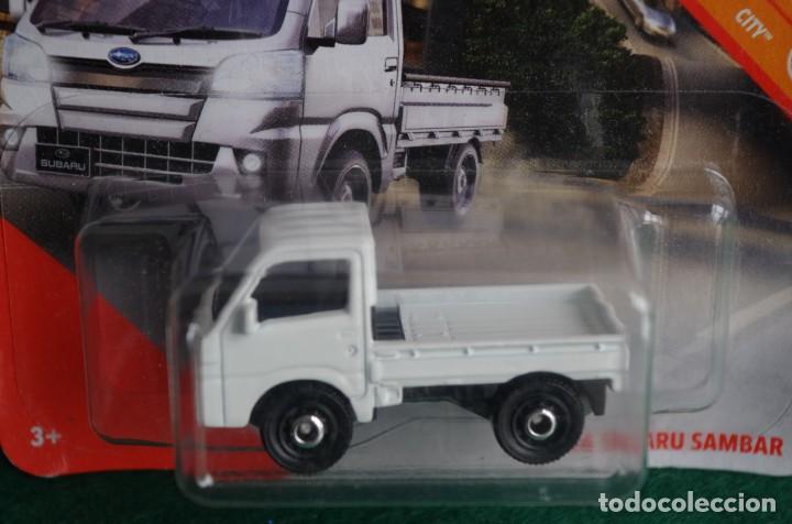 Coches a escala Matchbox: MATCHBOX 2014 SUBARU SAMBAR 17/100 - Foto 2