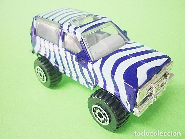 Coches a escala Matchbox: MATCHBOX MB187 E * 87 FORD BRONCO II - Foto 1