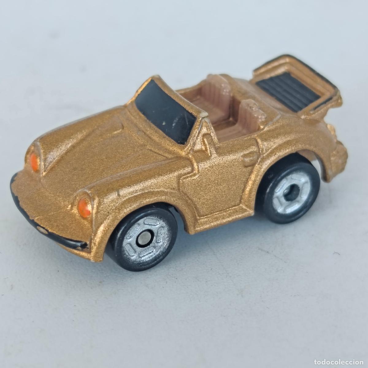 Coches a escala Matchbox: Porsche 911 micro machines dorado oro