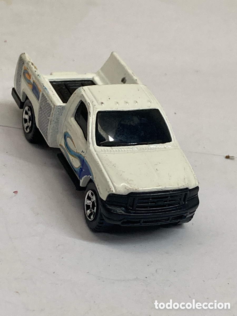 Coches a escala Matchbox: Matchbox Ford F-250 Super Duty blanco con gr&aacute;ficos azules y naranjas de &rdquo;Sea Rescue