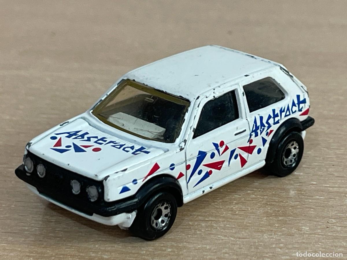 Coches a escala Matchbox: 839- Antiguo coche Matchbox Volkswagen Golf GTI blanco Abstract vw 1985 1:58 Made Thailand die-cast