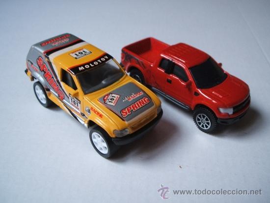 Coches a escala: ford explorer de guisval y ford f-150 svt raptor de maisto, escala 1:64 aprox