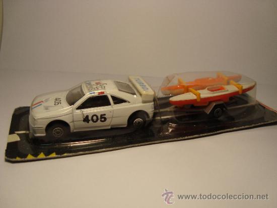 Coches a escala: PEUGEOT 405 DE MC TOY 1,64 CON REMOLQUE DE CANOASNUEVO EN SU CAJA BLISTER