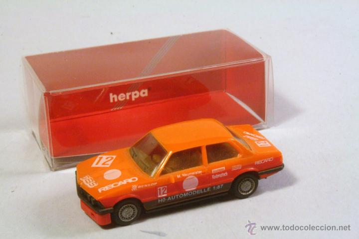 Coches a escala: HERPA #3562. Escala 1/87. BMW 323i E21naranja #12 M.Neumeister. En caja original