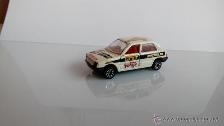 Coches a escala: peugeot de guisval michelin