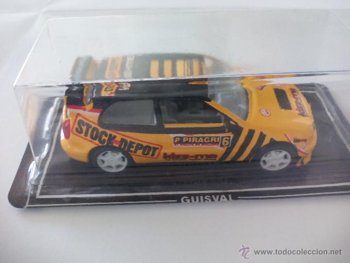 Coches a escala: Coche de Guisval.  Miniaturas de metal. Desconozco el modelo Stock Depot. P. Piragri