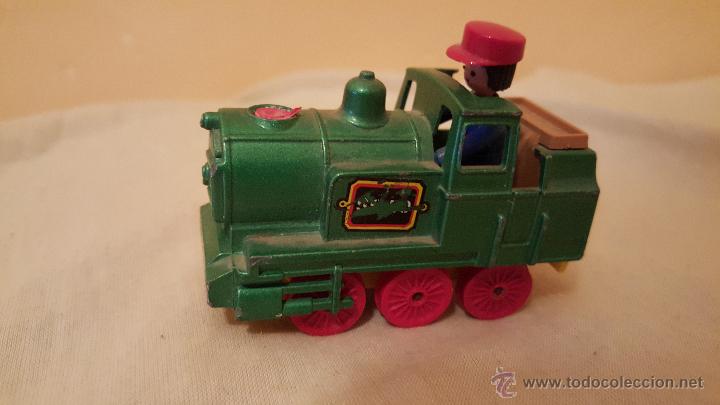 Coches a escala: tren de metal con mu&ntilde;eco, guisval