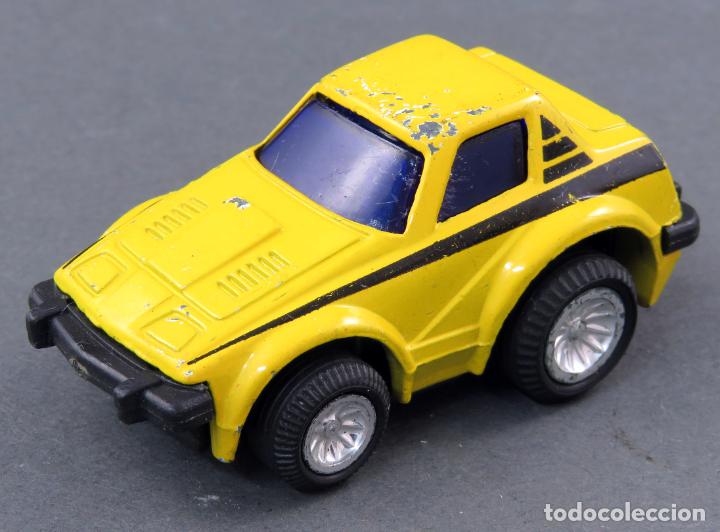 Coches a escala: Triumph sin marca amarillo a&ntilde;os 80