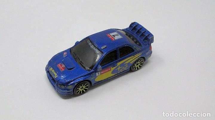Coches a escala: Subaru Impreza WRC de Majorette, Escala 1/57.